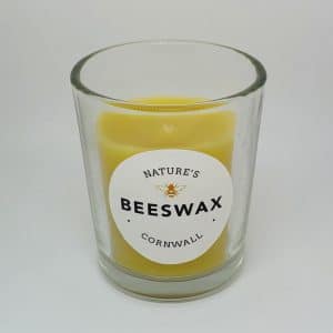 image of beeswax candle in glass